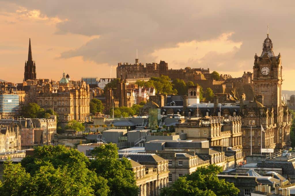 A view of Old Town Edinburgh has the Balmoral clock tower and Edinburgh Castle in the background.