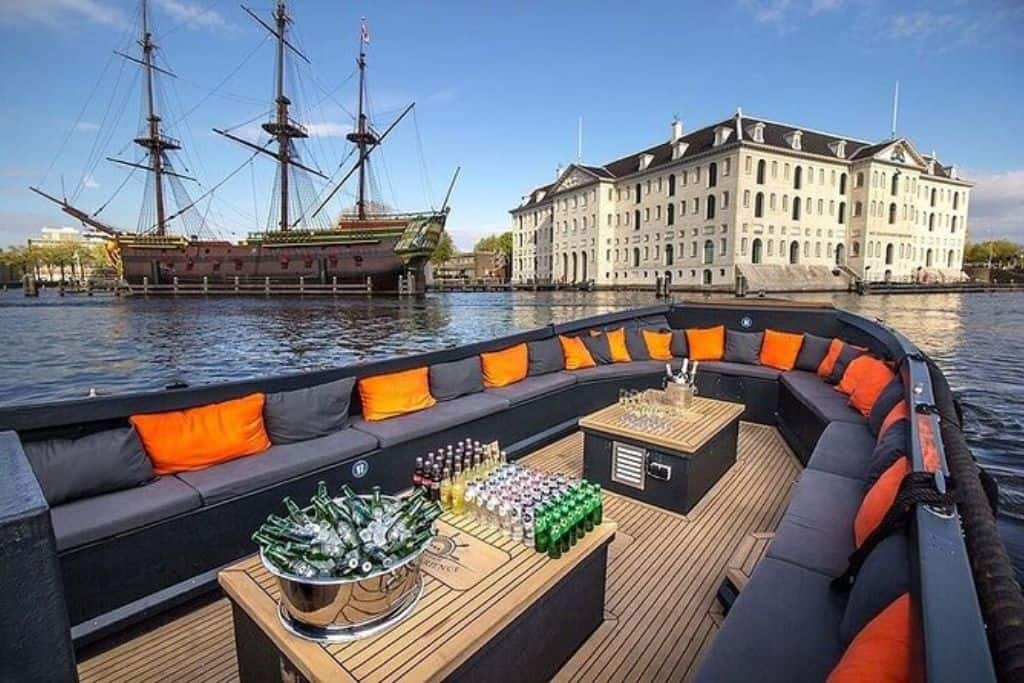One of the best canal cruises in Amsterdam- Flagship canal cruises with beverages and comfortable seating.
